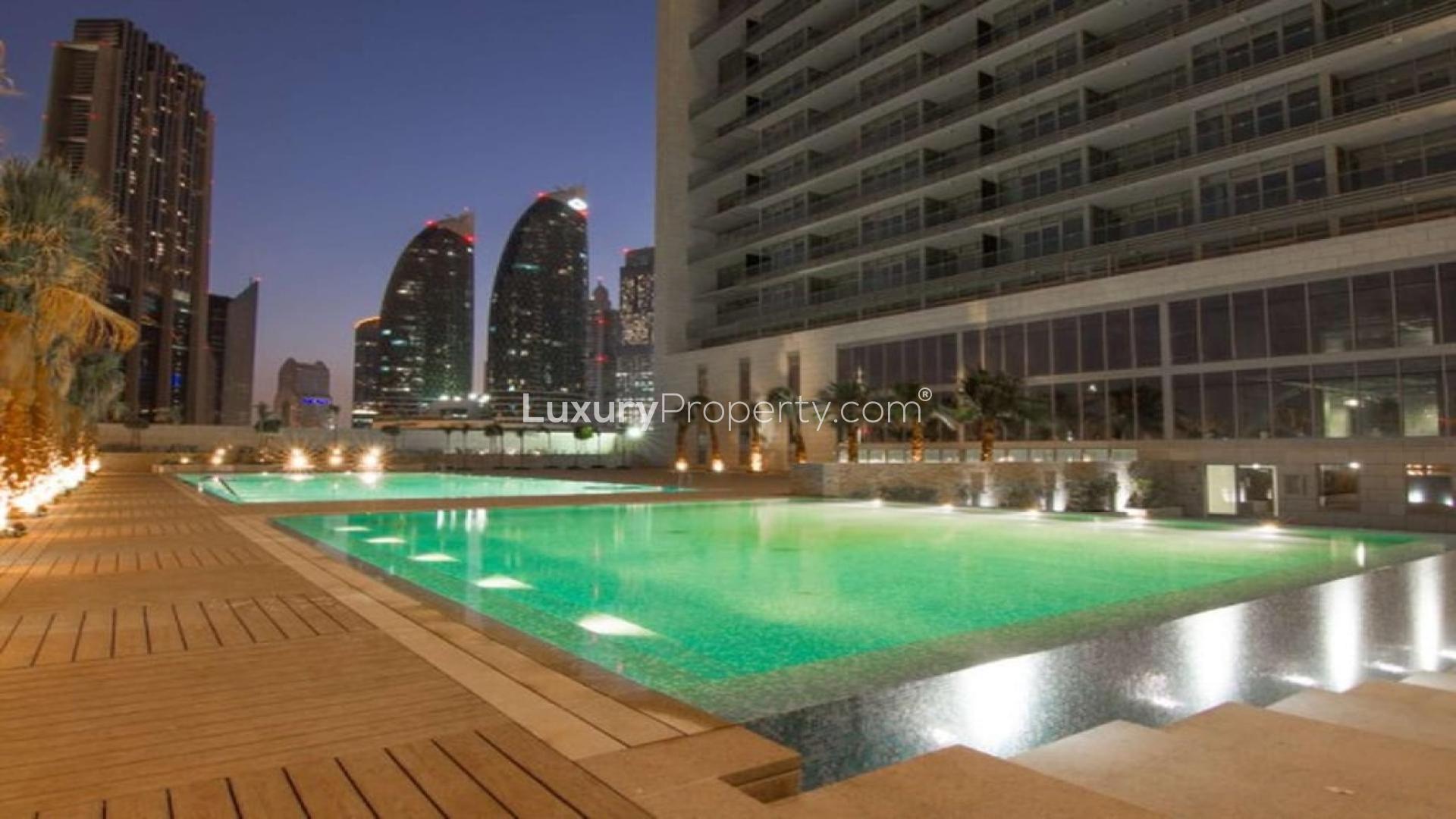 High floor apartment kitchen with wooden flooring in Burj Daman, DIFC, for sale