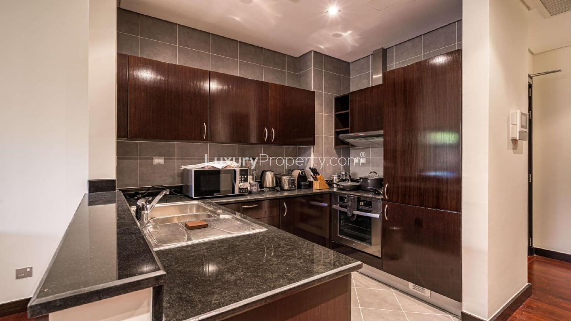 Luxurious living room in Palm Jumeirah apartment with elegant dining area, Anantara Residences