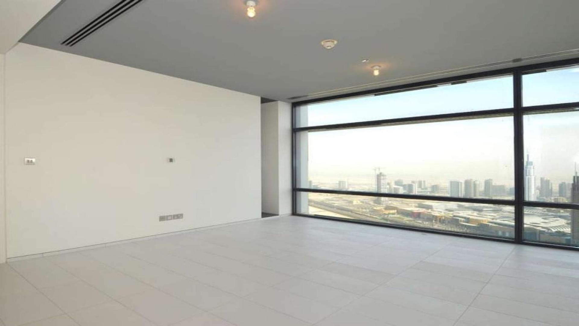 Modern open-plan living area in luxury one-bedroom apartment, Index Tower, DIFC, for sale