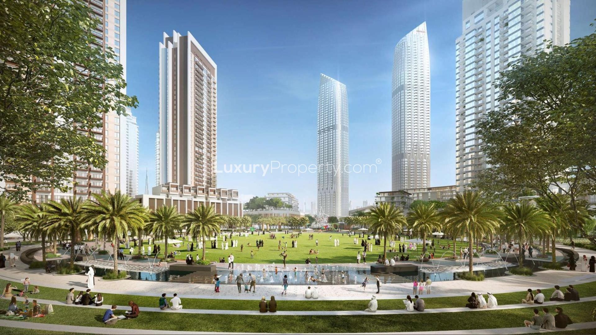 Exterior view of Creek Palace apartments, Dubai Creek Harbour, with landscaped gardens and skyline