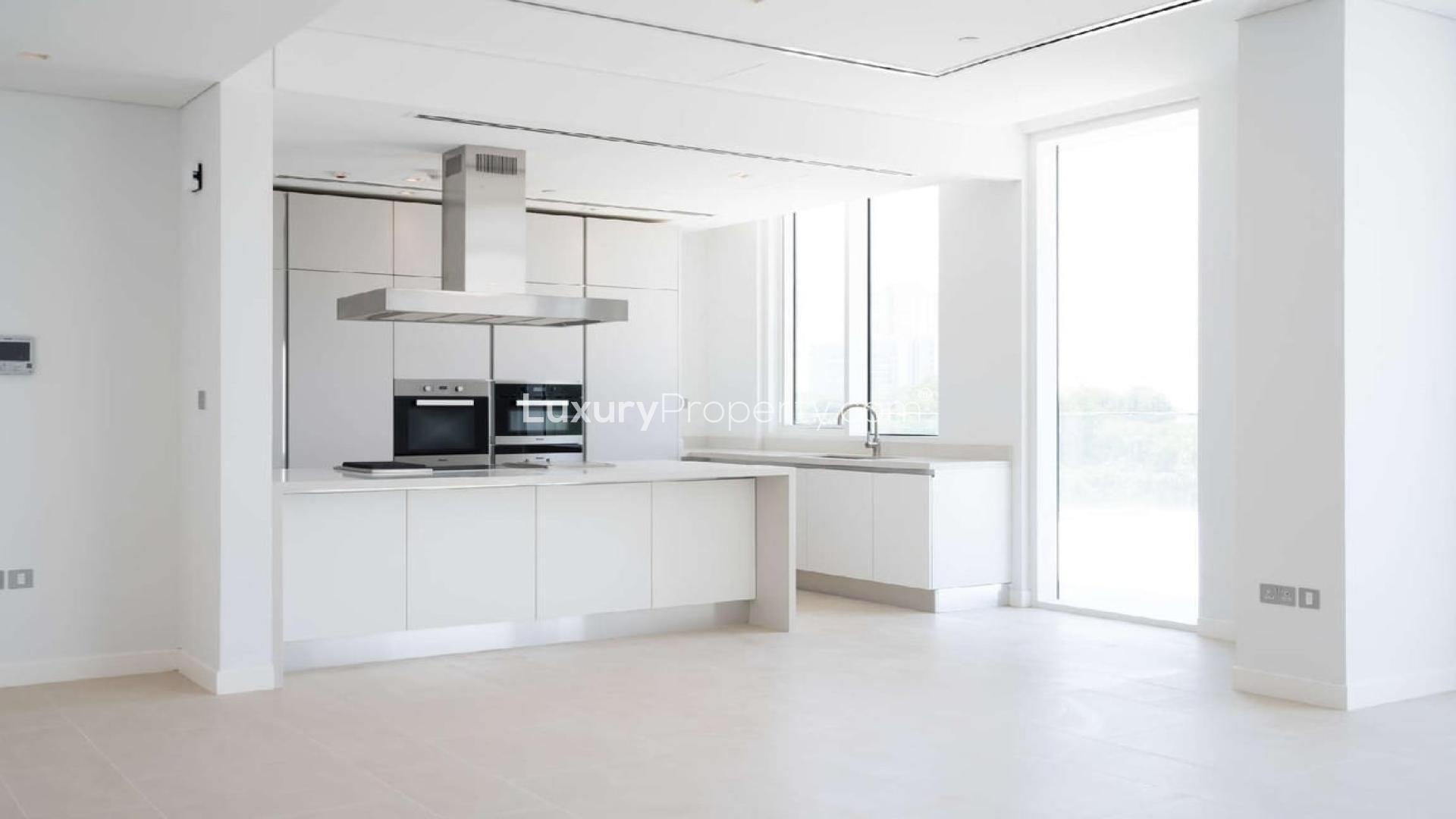 Modern kitchen in 1-bedroom apartment, Seventh Heaven, Al Barari, for sale, bright and spacious