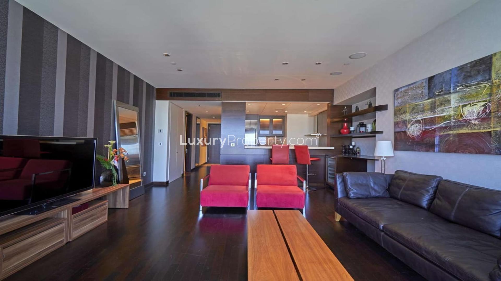 High-floor Downtown Dubai apartment living room with city view, modern furnishings, Burj Khalifa Area