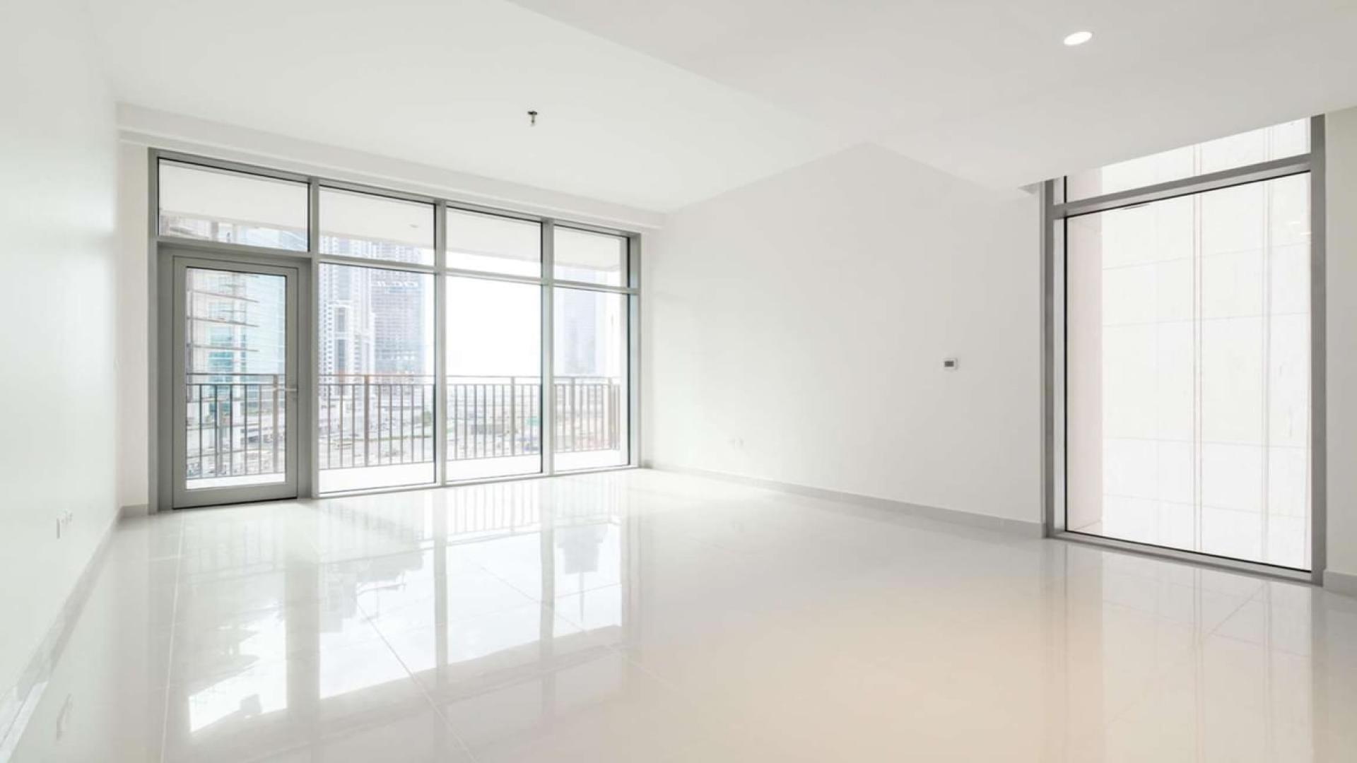 Bright Downtown Dubai apartment with large windows and balcony view in BLVD Crescent