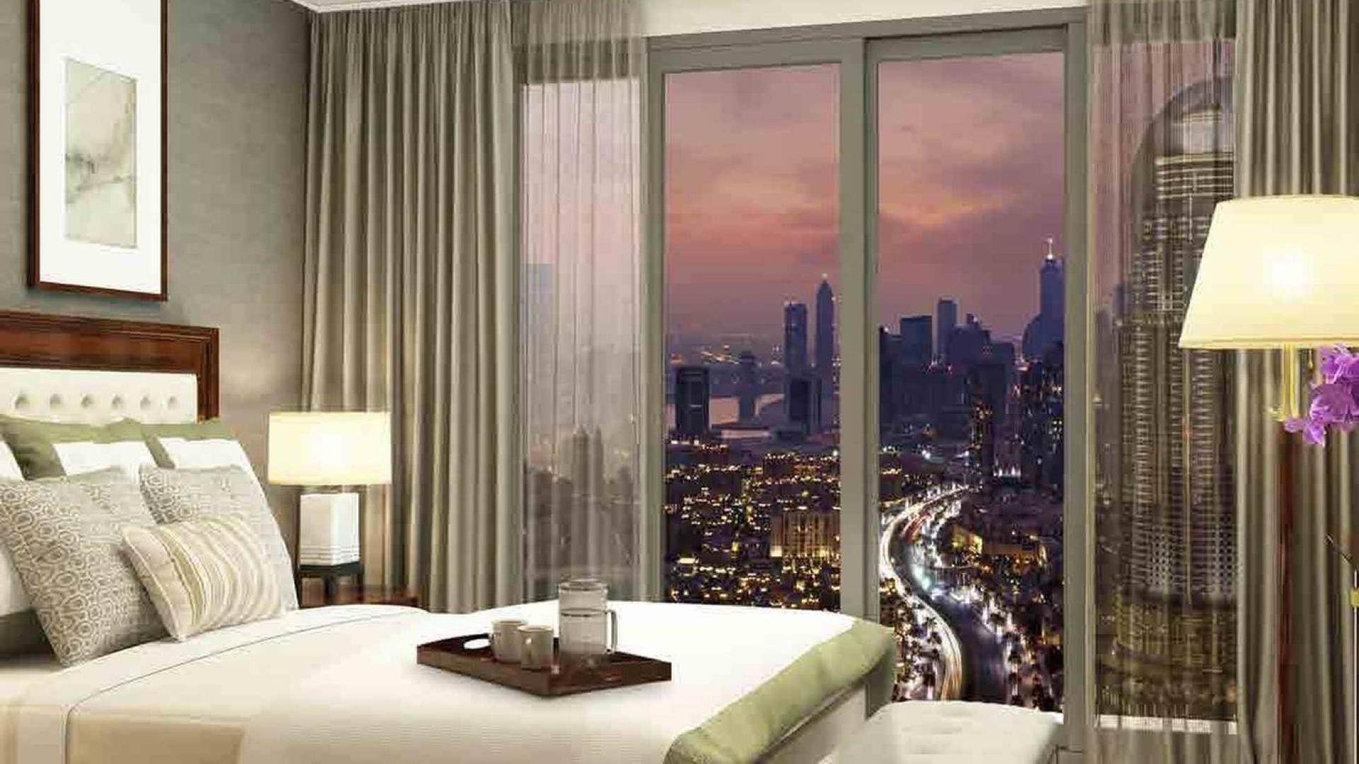 Luxurious studio apartment interior at Boulevard Point, Downtown Dubai, with city skyline views