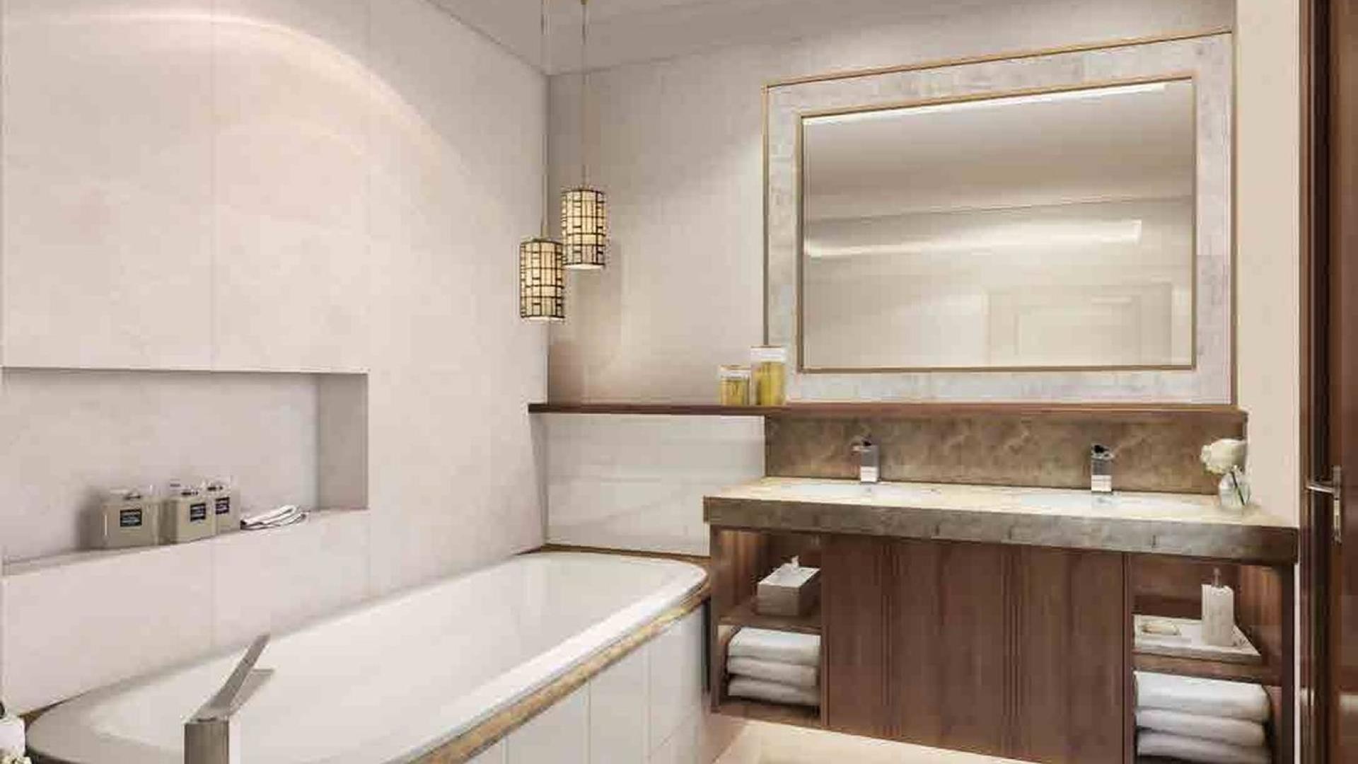 Boulevard Point apartment view, Downtown Dubai skyline, waterfront and greenery, vibrant urban lifestyle