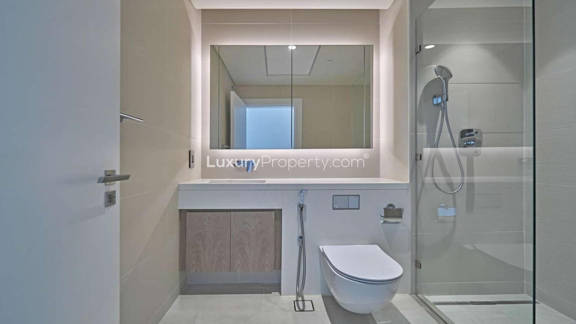 Modern bathroom in Serenia Residences apartment, Palm Jumeirah, featuring sleek fixtures and spacious shower