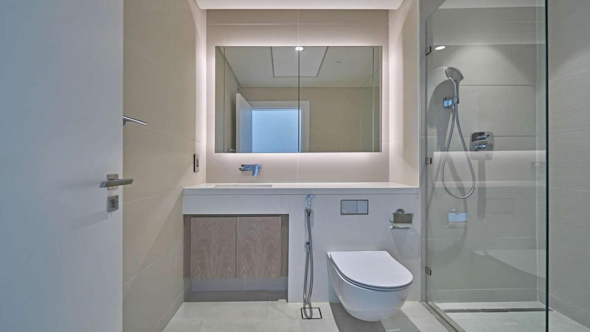 Modern bathroom in Serenia Residences apartment, Palm Jumeirah, featuring sleek fixtures and spacious shower