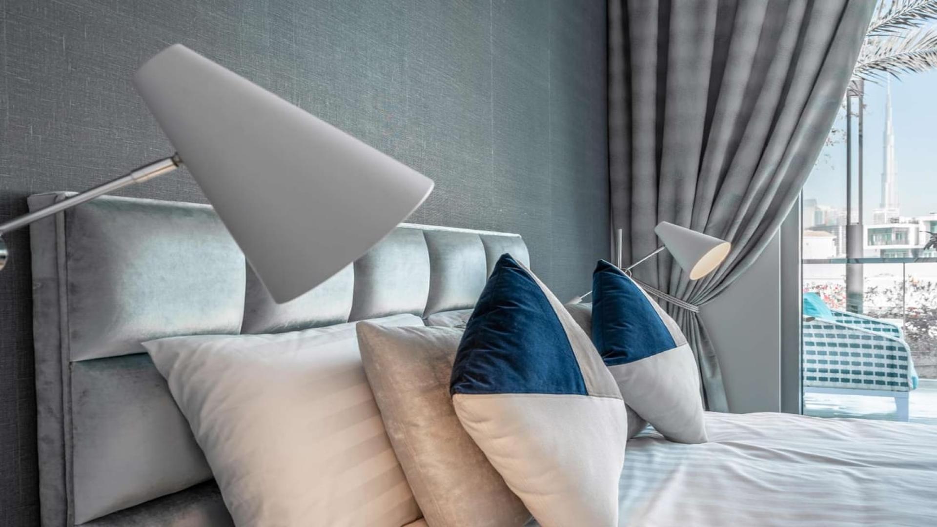 Modern furnished kitchen and living area in District One apartment, Mohammed Bin Rashid City