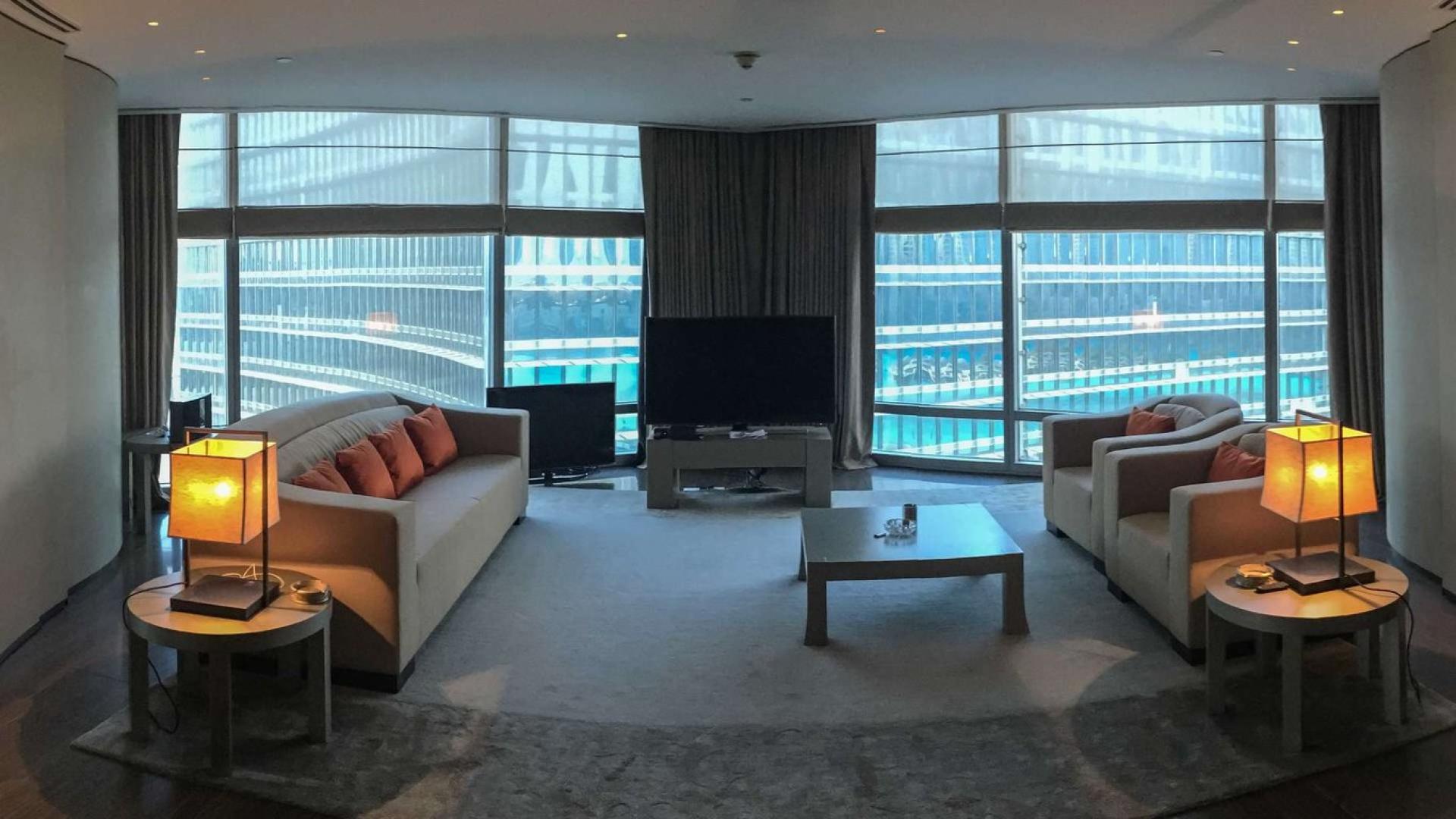 Luxurious living room in Armani Residences apartment, Downtown Dubai, with modern furnishings