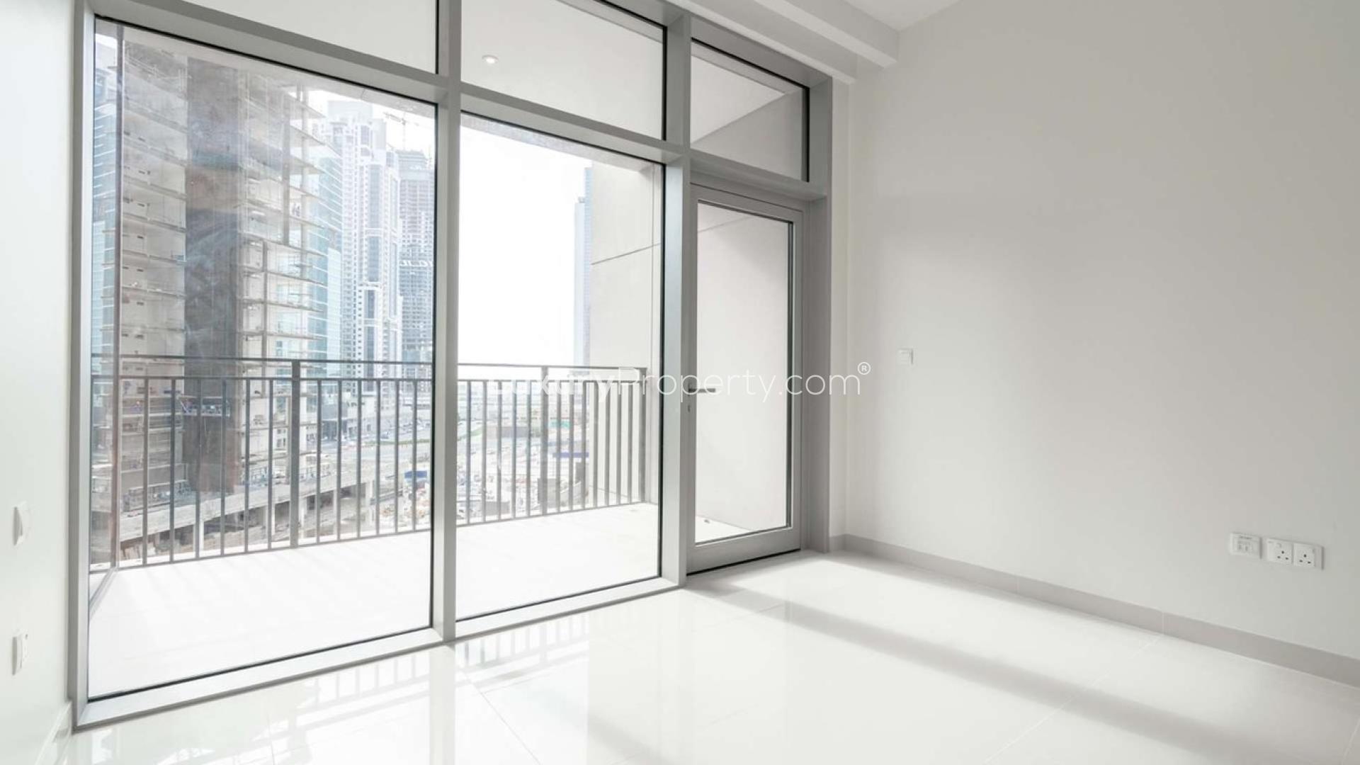Spacious living area in two-bed apartment, Boulevard Crescent Tower One, Downtown Dubai