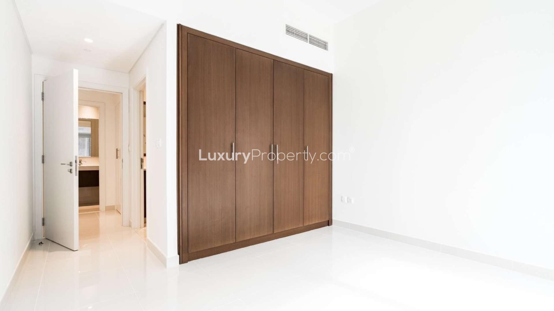 Bright living room with large windows in Boulevard Crescent Tower 1, Downtown Dubai apartment