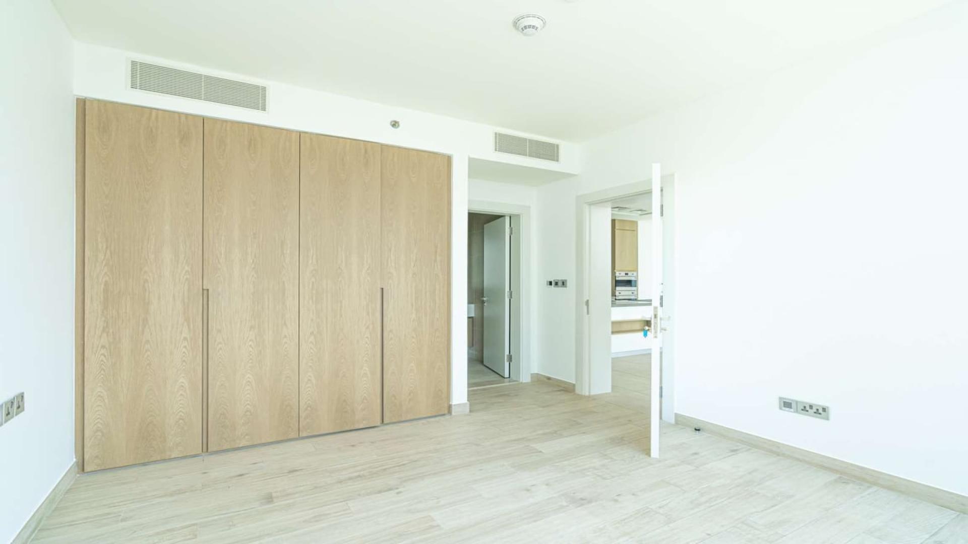 Modern kitchen with large windows in one-bed Serenia Residence apartment, Palm Jumeirah