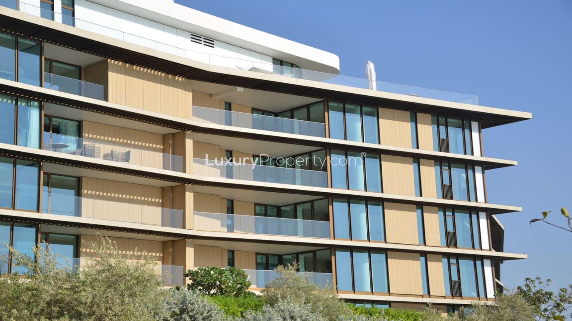 Bright living area with wooden floors in Bulgari Residences, Jumeirah Bay Island apartment