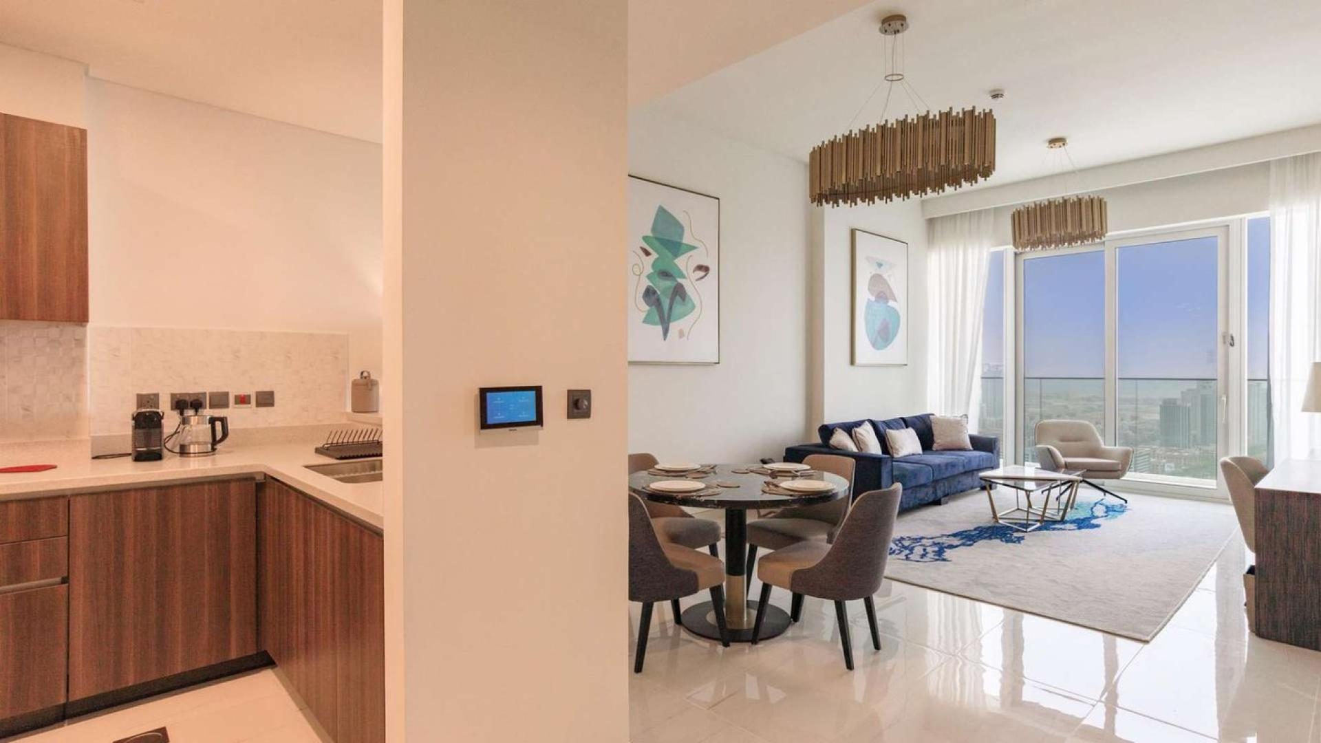 Fully furnished 1-bedroom apartment living area in Avani Palm View, Dubai Media City