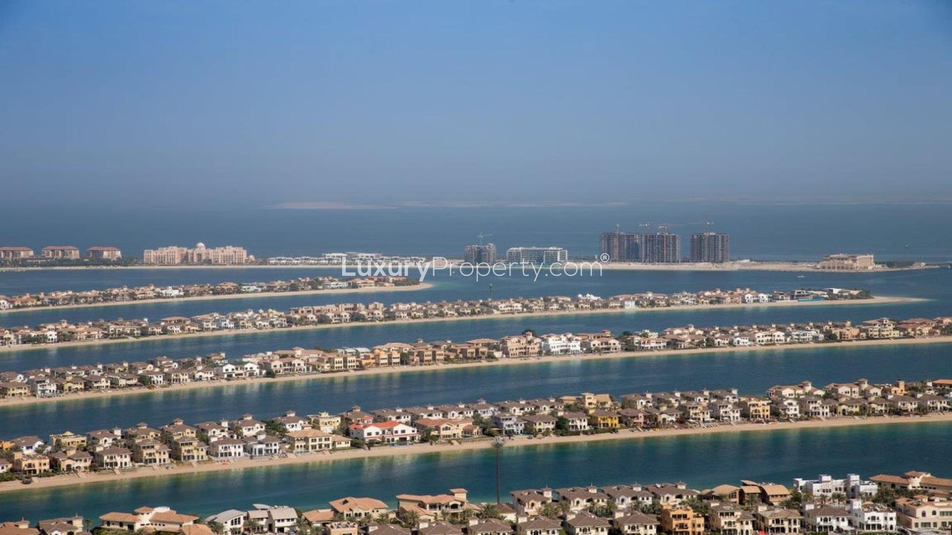 Modern living area in Palm Jumeirah apartment with ocean views, spacious layout, and elegant decor