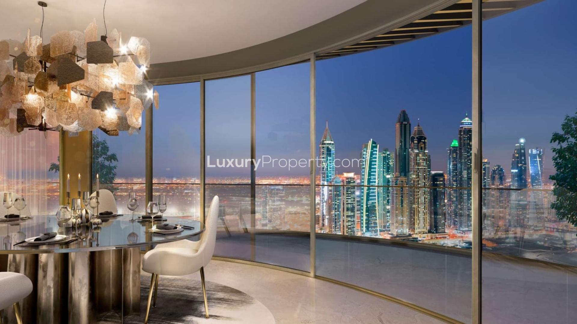 Modern kitchen and dining area with ocean view in Emaar Beachfront apartment, Dubai Harbour