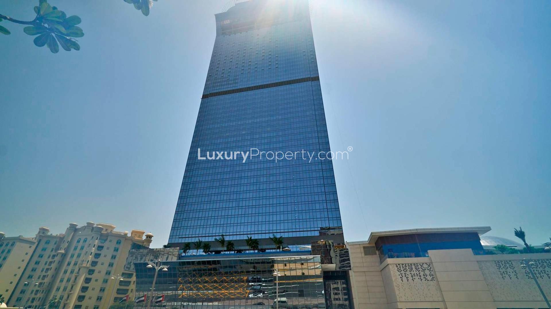 Furnished living room in Palm Jumeirah apartment with sea views, modern decor, and natural light