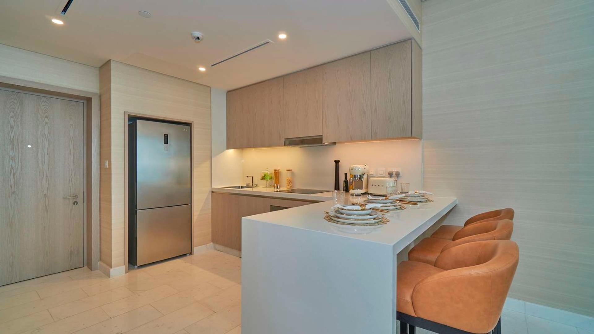 Apartment view of Palm Jumeirah skyline and Arabian Gulf from The Palm Tower