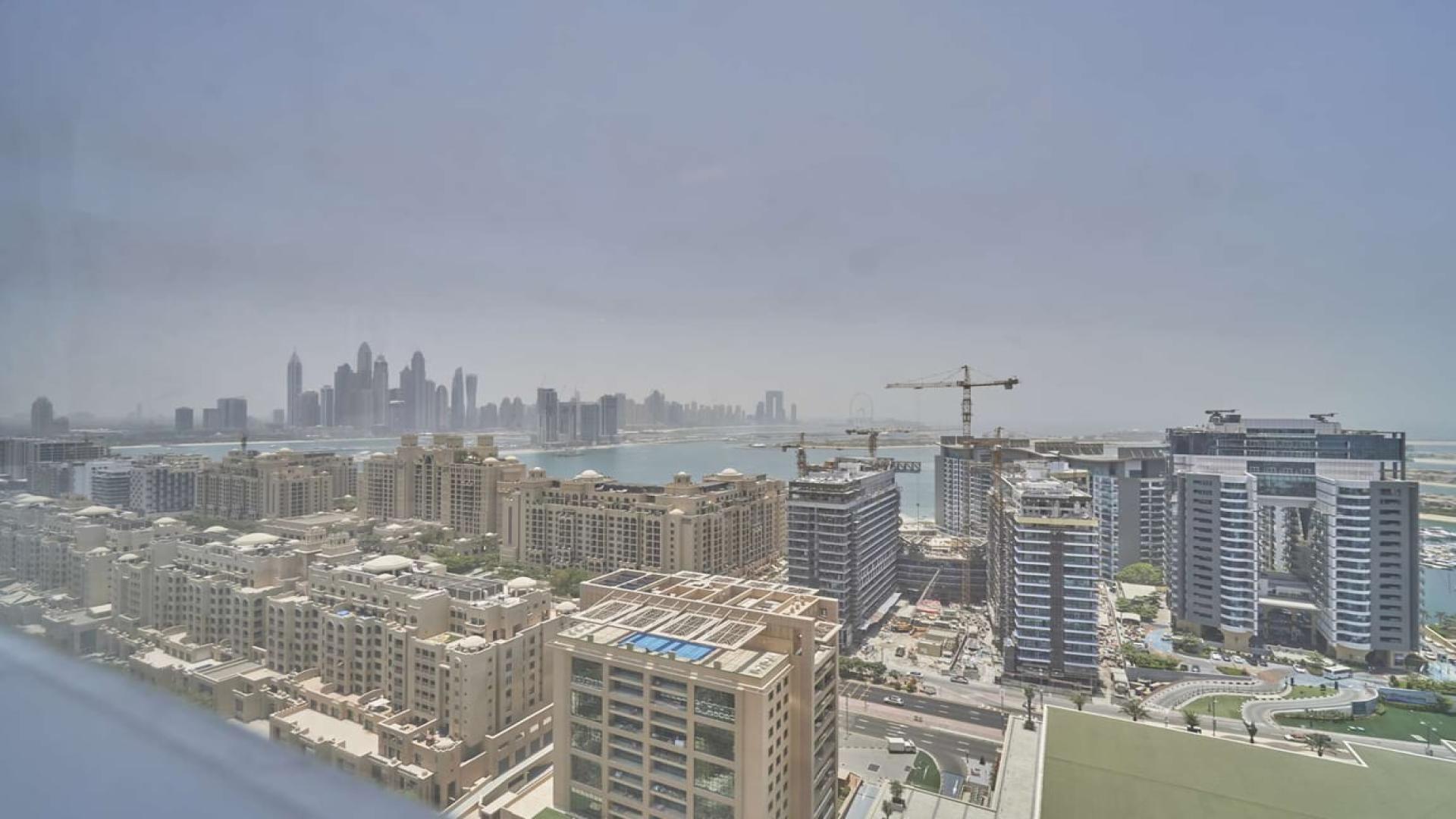 Aerial view of Palm Jumeirah skyline from The Palm Tower apartment for sale