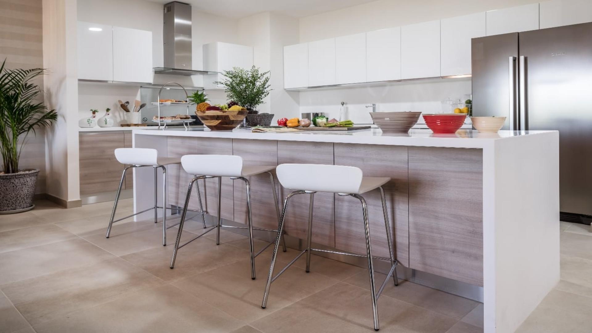 Modern living room and kitchen in Al Andalus Tower F apartment for sale