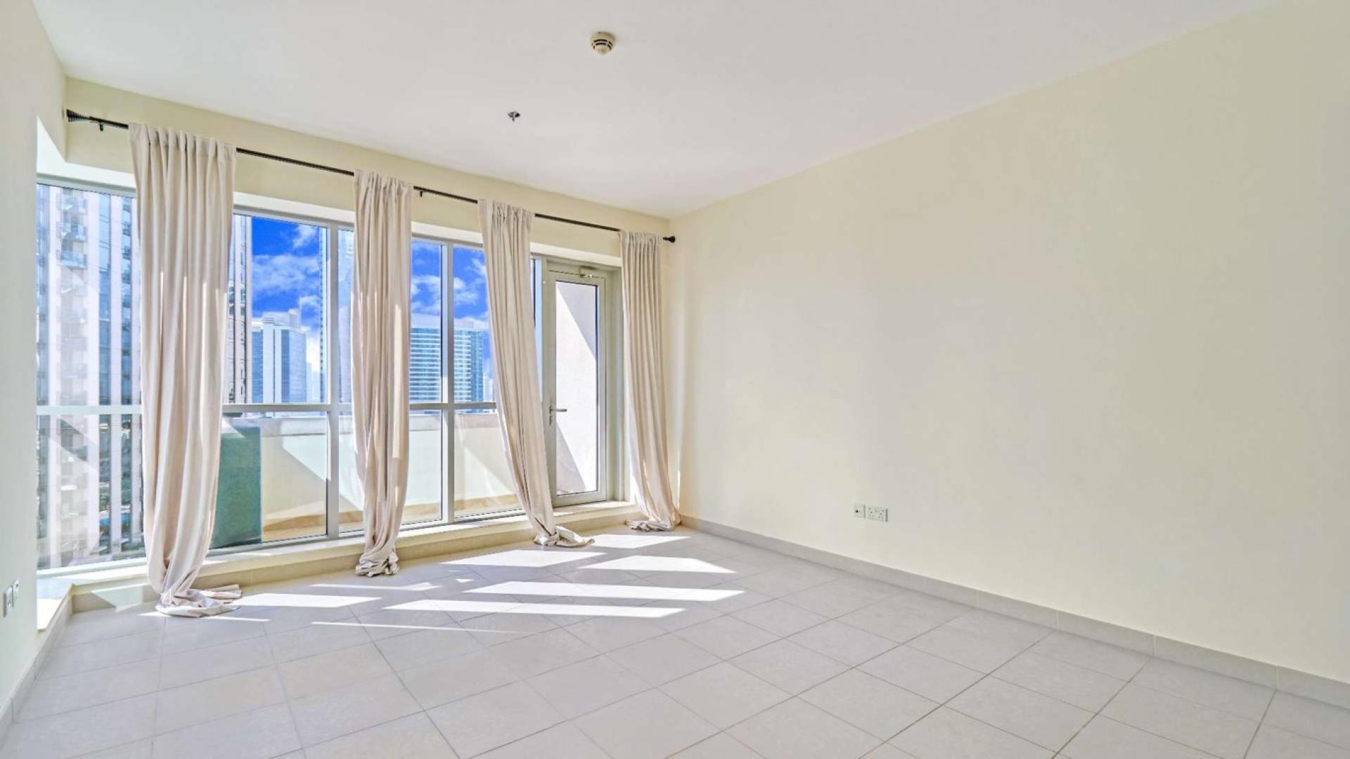 Skyline view from Boulevard Central Towers, Downtown Dubai, showcasing modern architecture and palm-lined streets