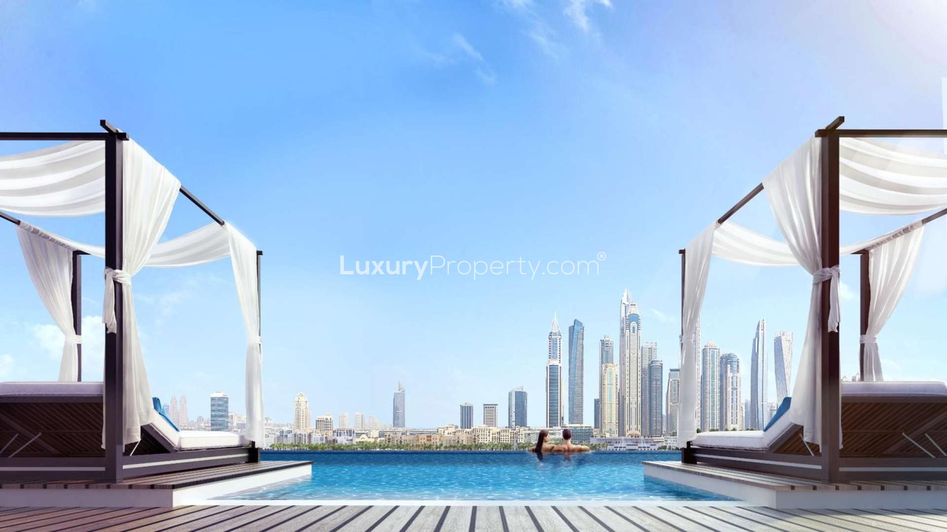 Furnished bedroom with city view in Emaar Beachfront apartment, Dubai Harbour