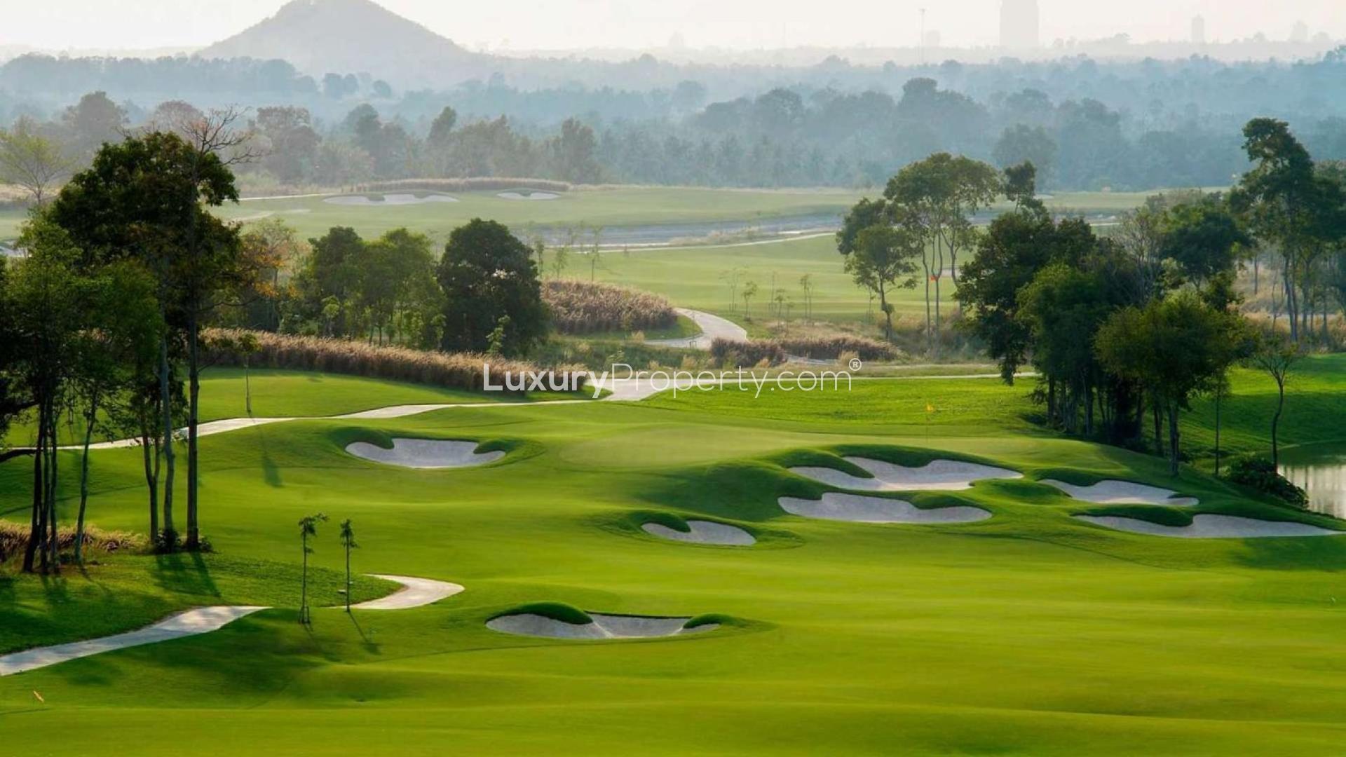 Modern 1-bedroom apartment interior with golf course views in Damac Hills, The Drive