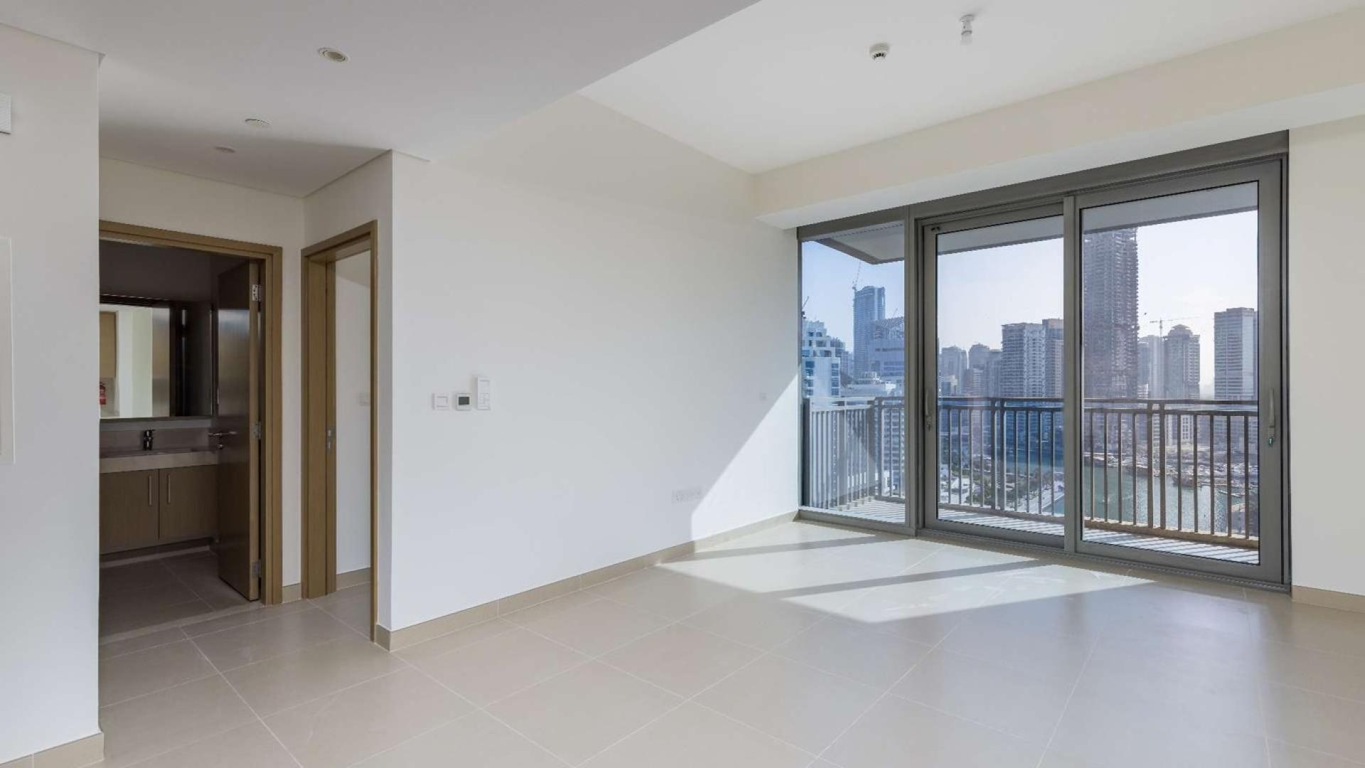 Dubai Marina skyline view from apartment for sale, featuring waterfront and modern architecture