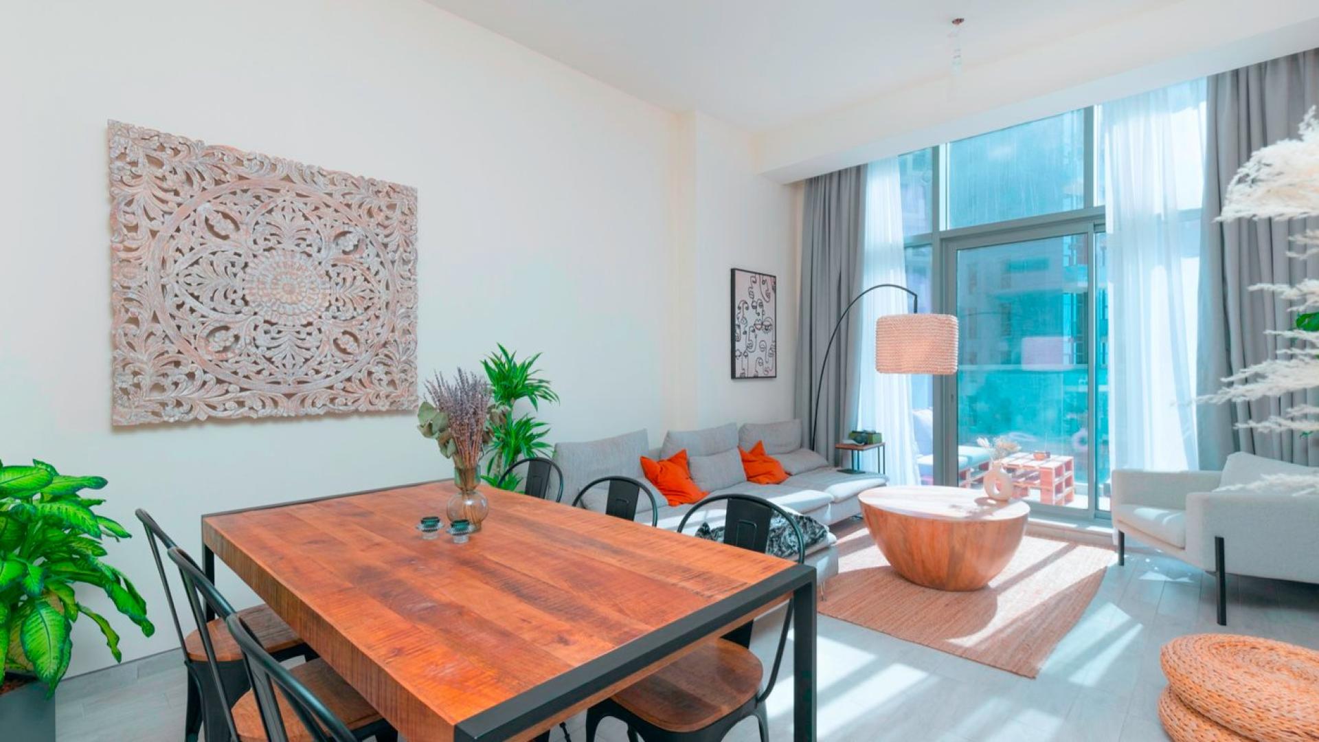 Modern living room in Atria waterfront apartment, Business Bay, featuring stylish decor and natural light