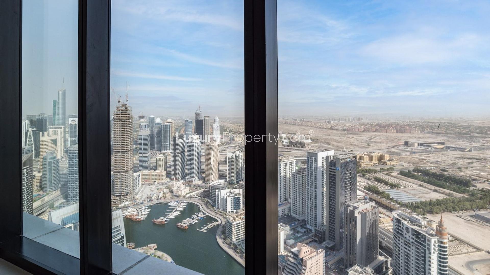 High-floor apartment view of Dubai Marina skyline from The Address Jumeirah Resort