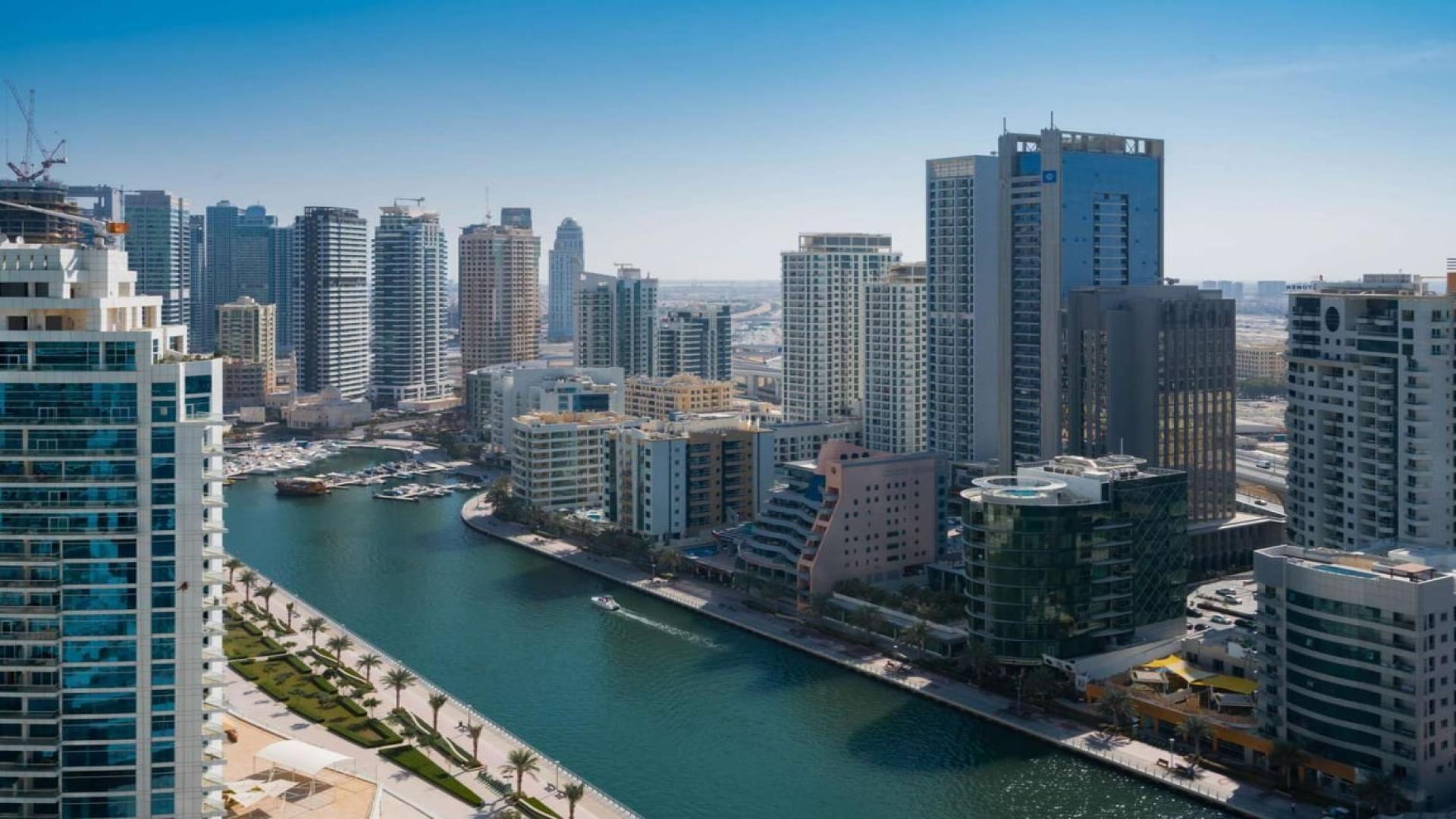 "Stunning view from The Address Jumeirah beachfront apartment, Jumeirah Beach Residence skyline.",Aerial view of Jumeirah Beach Residence waterfront skyscrapers near The Address Jumeirah Resort