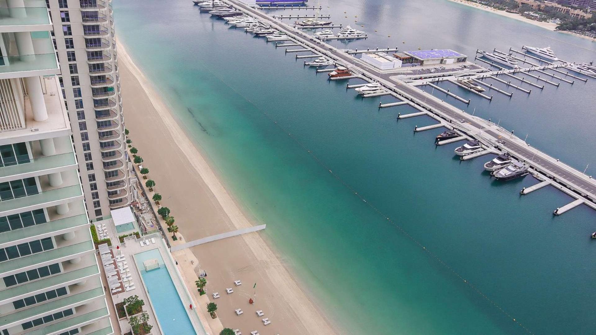 Stunning Marina and Palm Jumeirah view from Sunrise Tower apartment balcony in Dubai Harbour