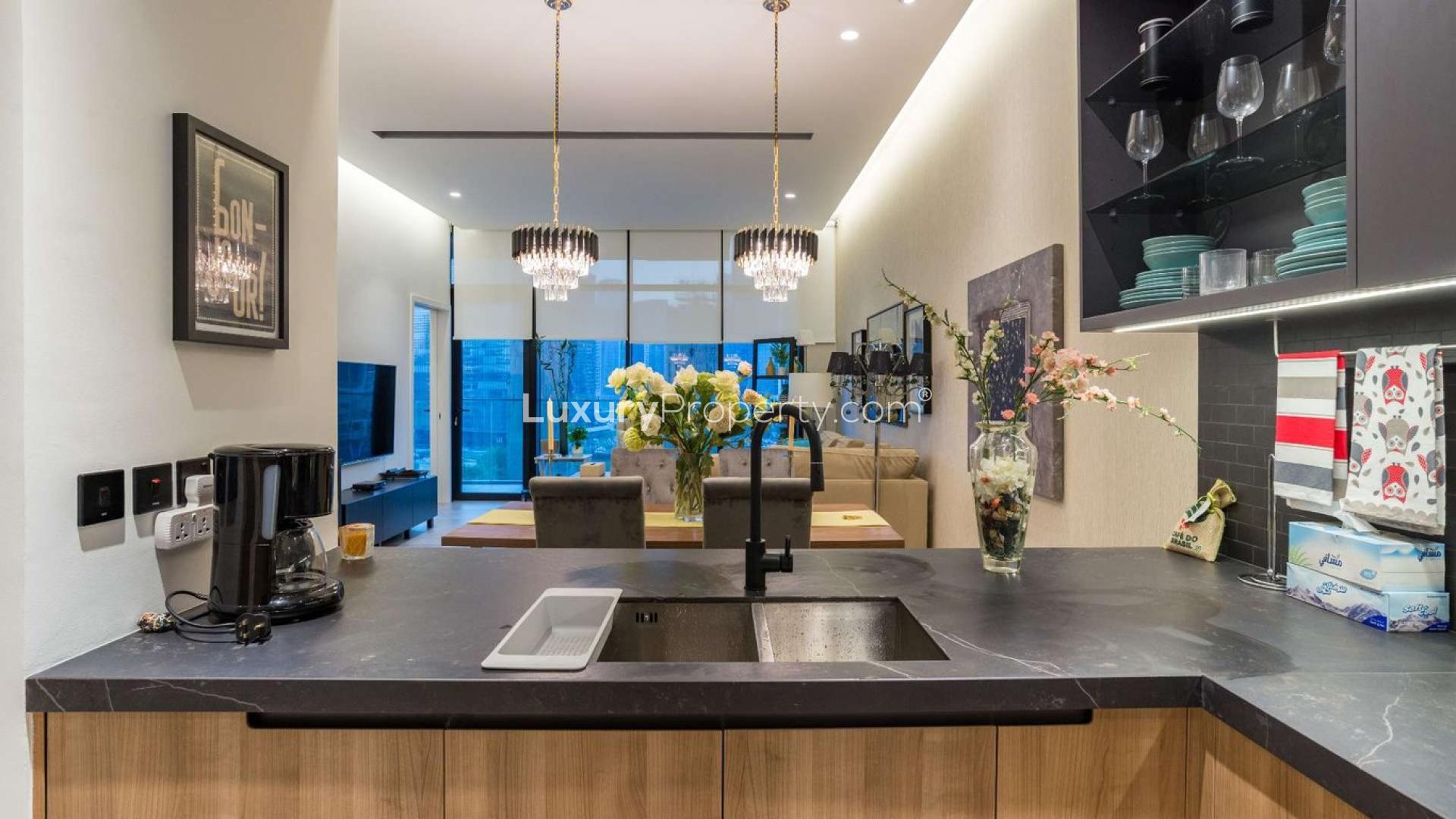 Modern living and dining area in DT 1 Tower apartment, Downtown Dubai