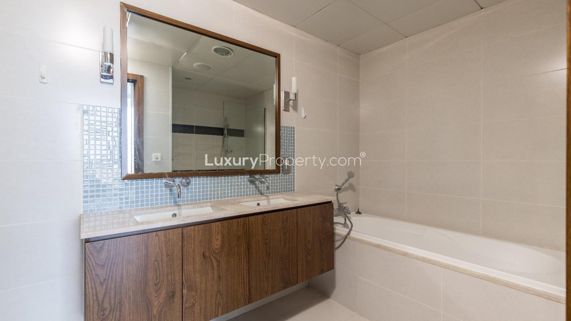 Open-plan kitchen and living area with sea view in Oceana, Palm Jumeirah apartment