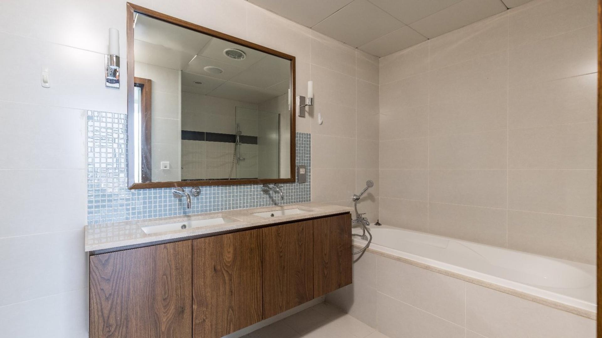 Open-plan kitchen and living area with sea view in Oceana, Palm Jumeirah apartment