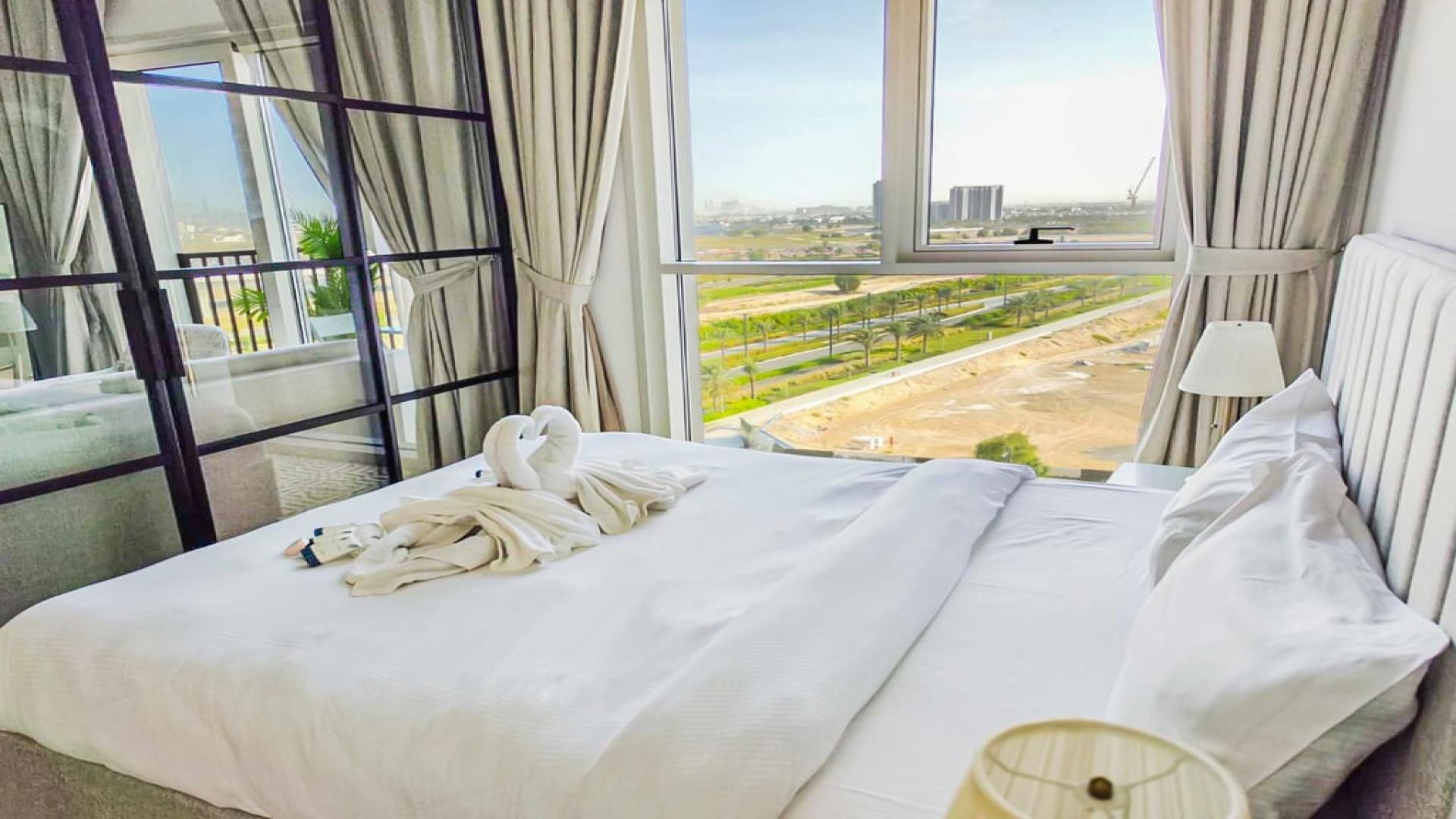 Balcony view of Dubai Hills Estate from Collective 2.0 furnished apartment for sale