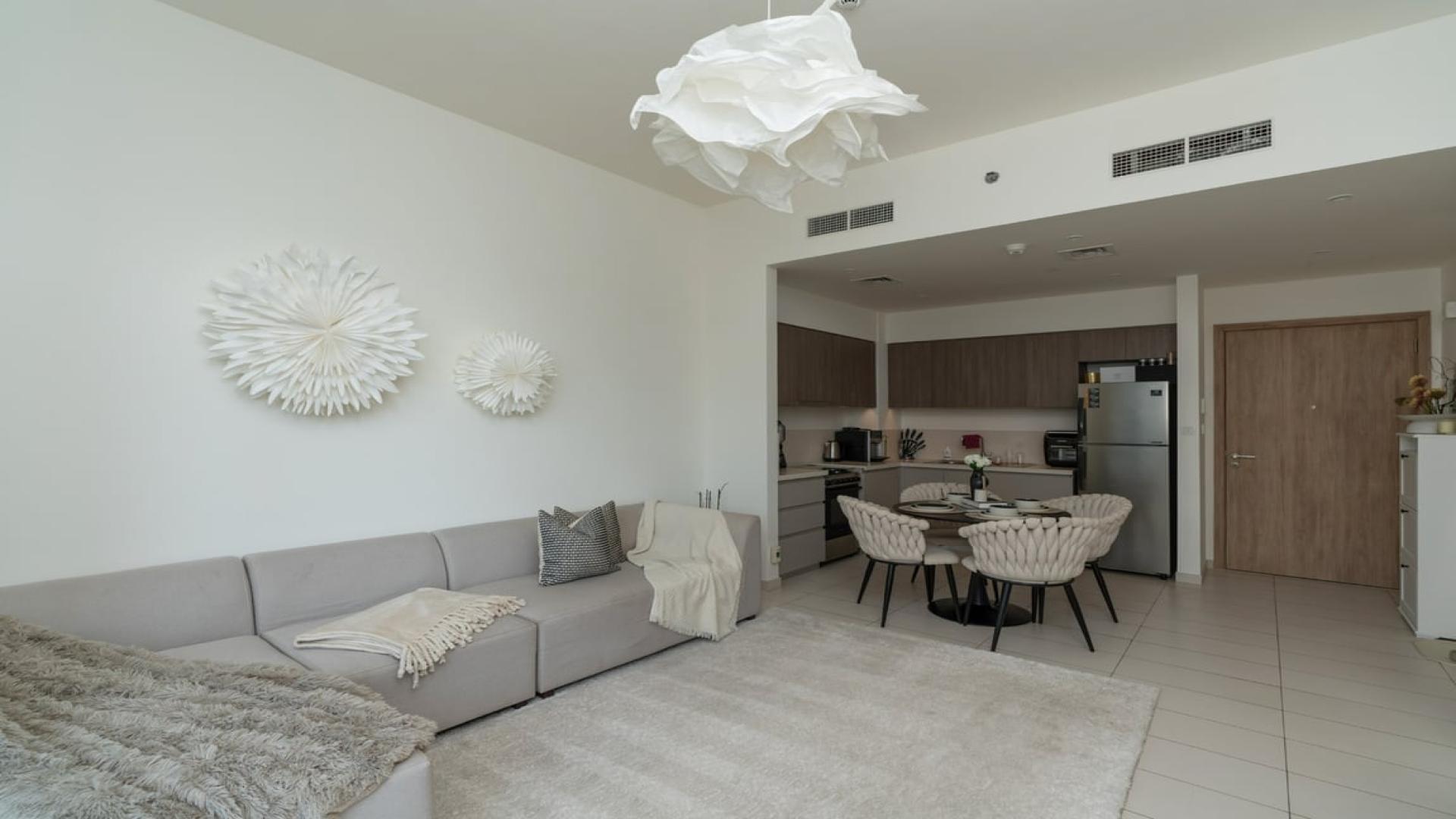 Modern kitchen and dining area in 1-bedroom apartment, Executive Residences, Dubai Hills Estate