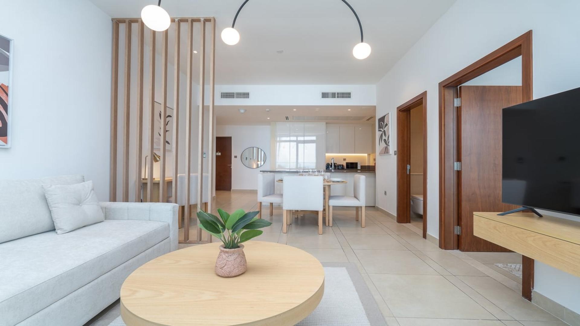 "Stunning Marina and Sea Views from Balcony, 1-Bed Apartment, Marina Gate, Dubai Marina.",Modern living room in 1-bedroom apartment at Marina Gate, Dubai Marina, featuring elegant decor