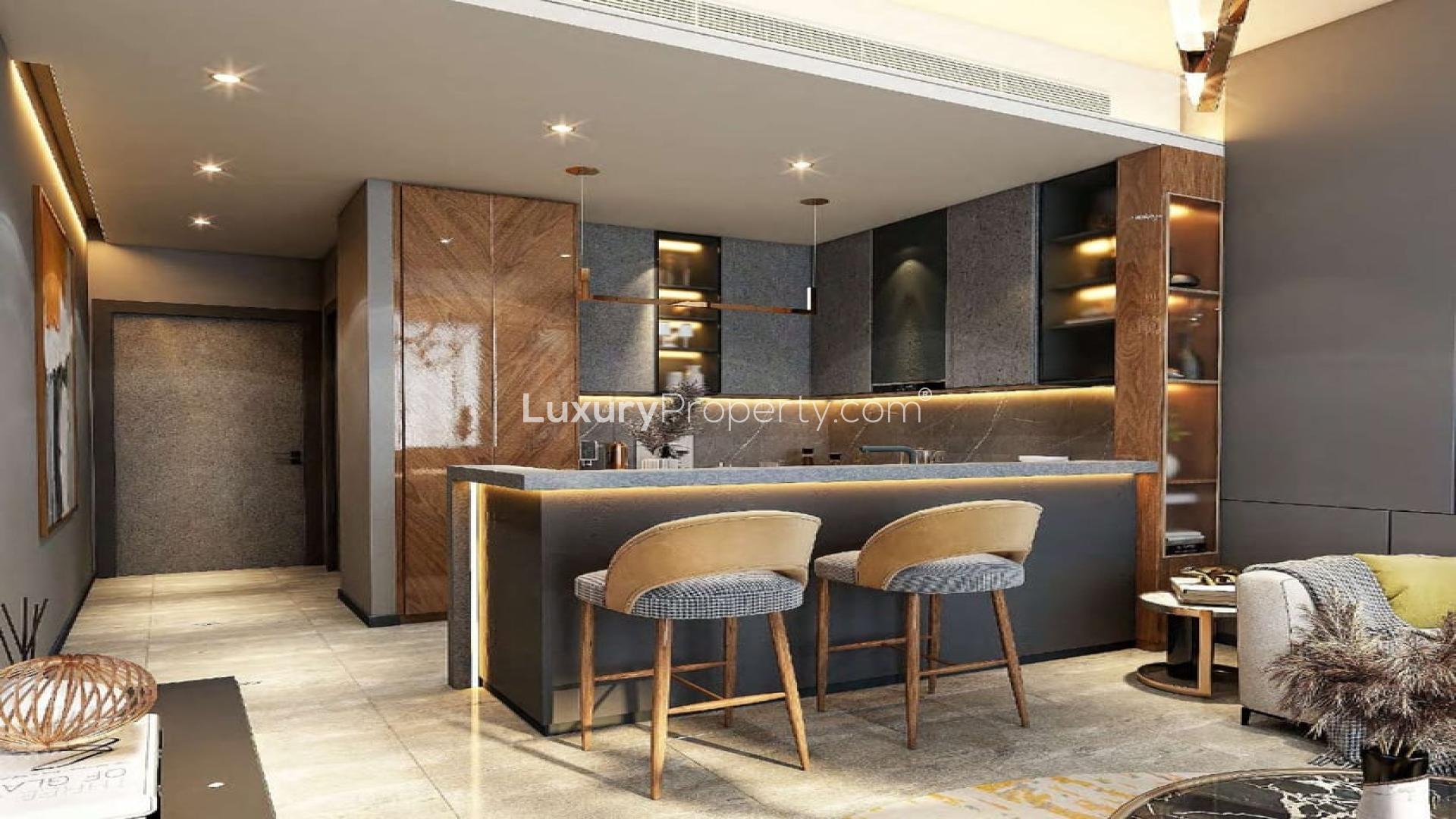 Aerial view of Jumeirah Lake Towers skyline, highlighting luxury apartment buildings at sunset