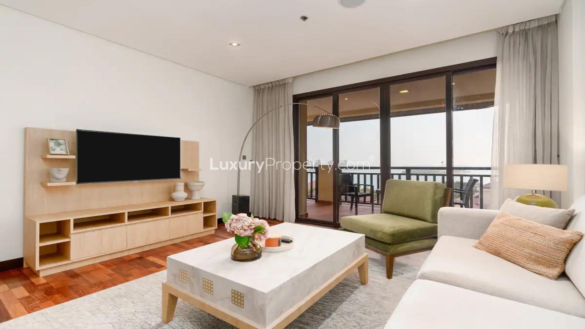 "Palm Jumeirah apartment balcony with full sea view, Anantara Residences, for sale.",Furnished beachfront apartment living room with sea view in Anantara Residences, Palm Jumeirah