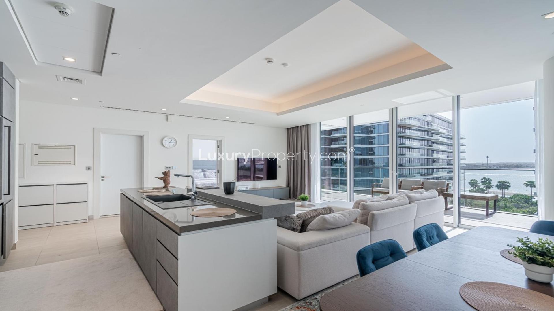 Luxurious open-plan living area in Serenia Residences apartment, Palm Jumeirah with sea view