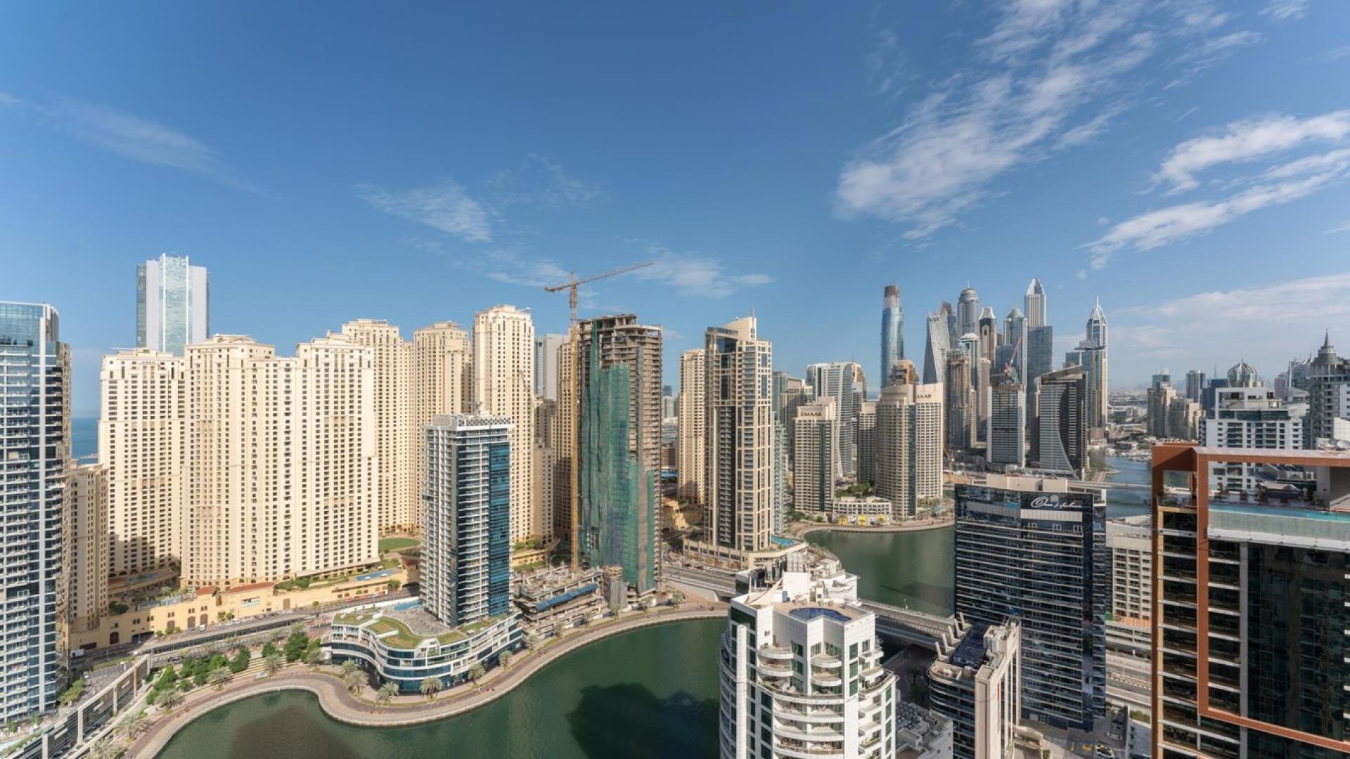 Luxurious living room in 1-bedroom apartment, The Address Dubai Marina, with city views