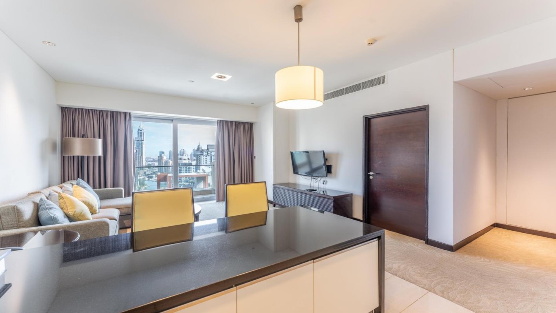 Luxurious open-plan kitchen and living area in The Address Dubai Marina apartment