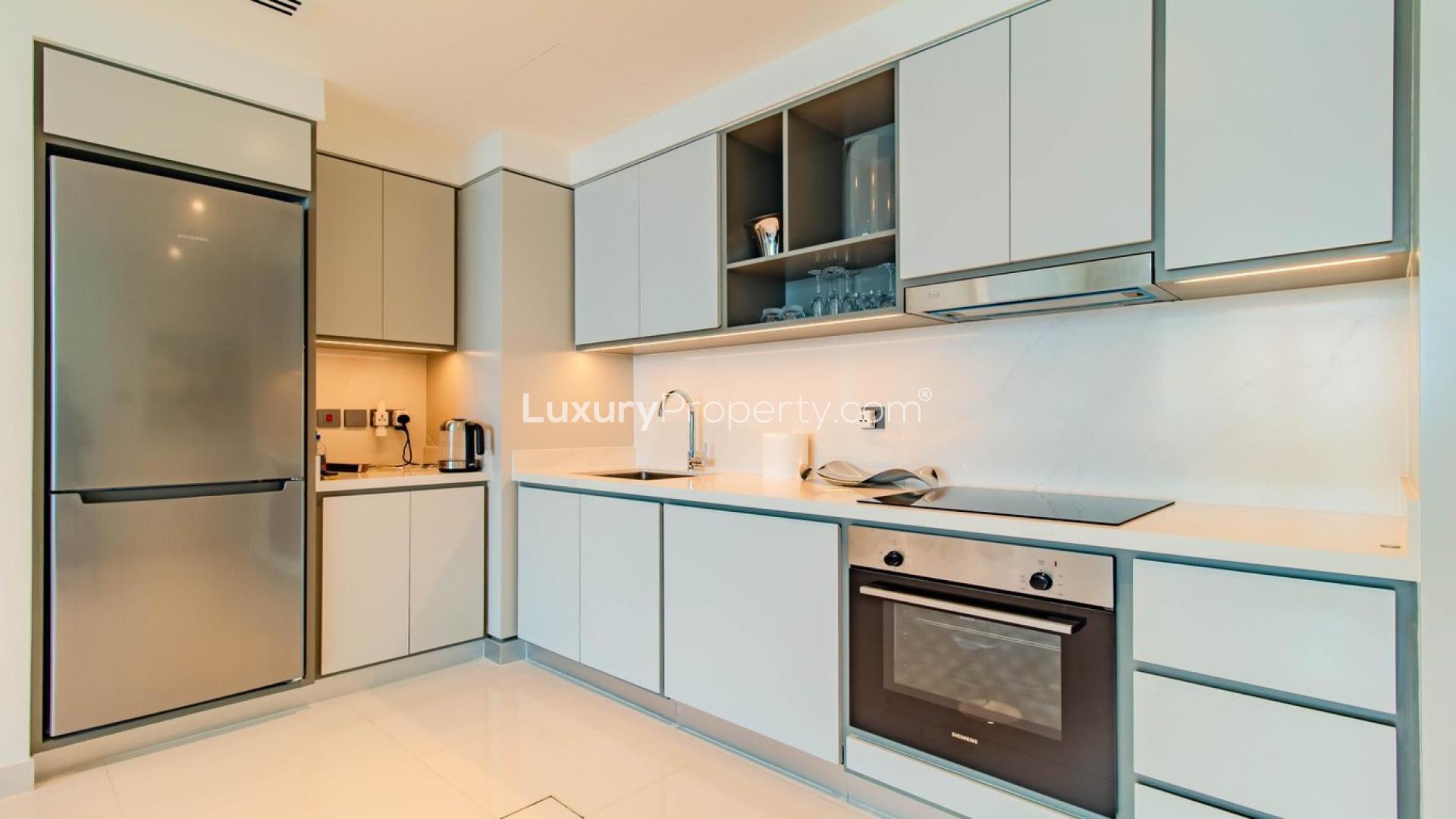 Modern kitchen in 1-bedroom apartment at Emaar Beachfront, Dubai Harbour for sale