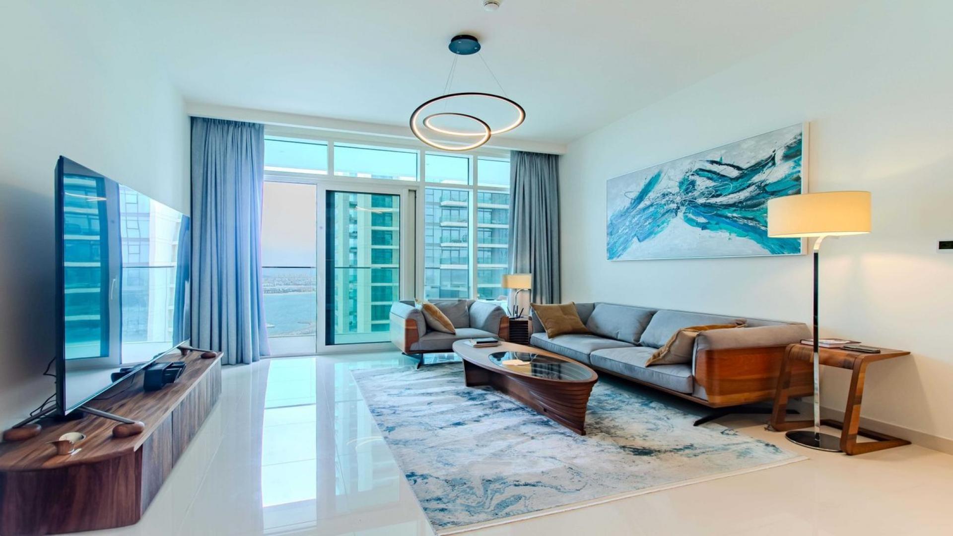 Elegant living area in 1-bedroom apartment, Emaar Beachfront, Dubai Harbour, modern decor and kitchen