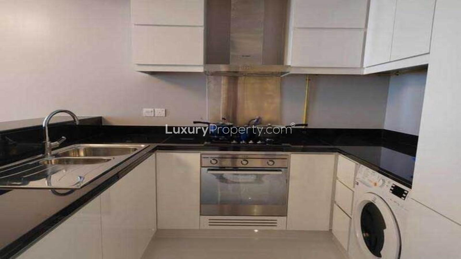 Balcony view of golf course from luxury apartment in Artesia, Damac Hills