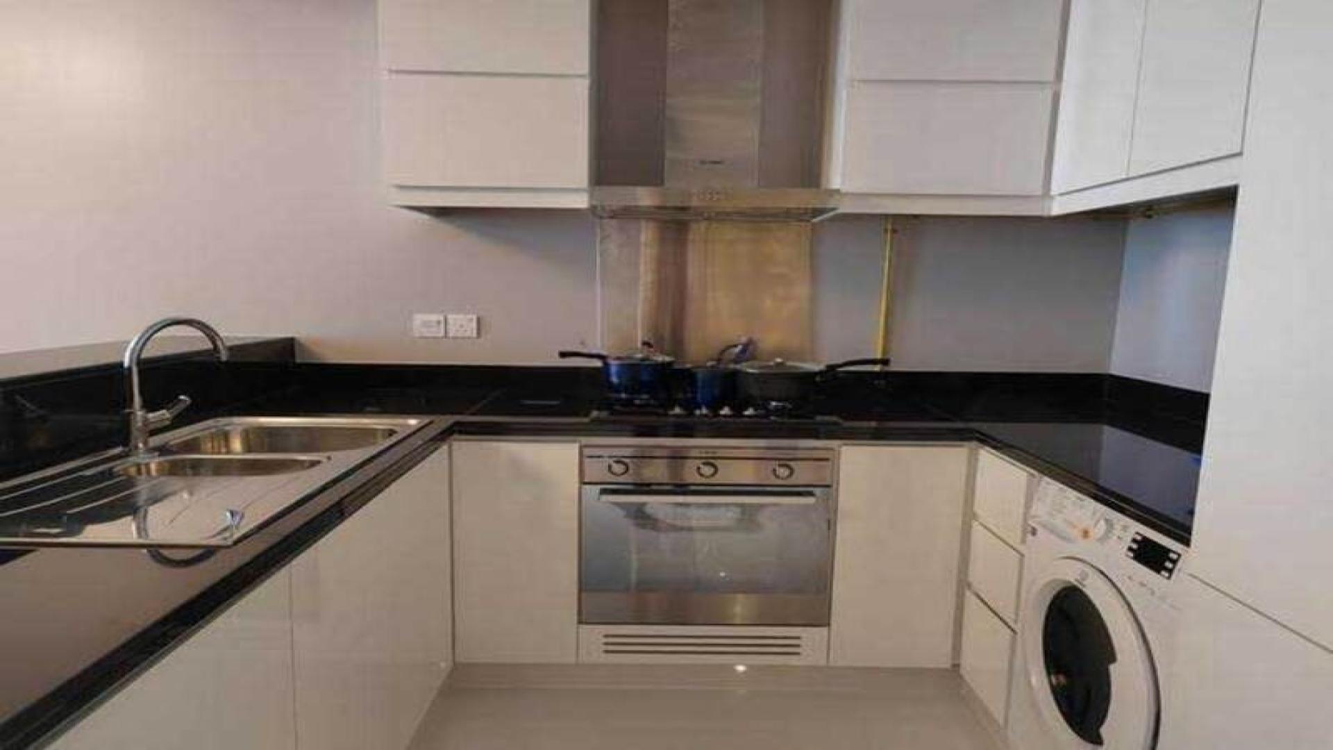 Balcony view of golf course from luxury apartment in Artesia, Damac Hills