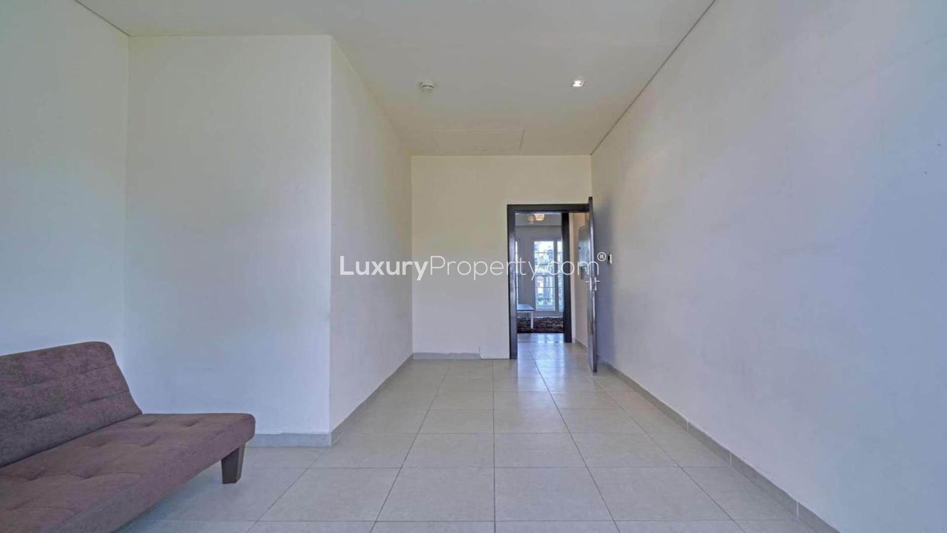 Furnished townhouse exterior in Nakheel Townhouses, Jumeirah Village Circle, Dubai, for rent