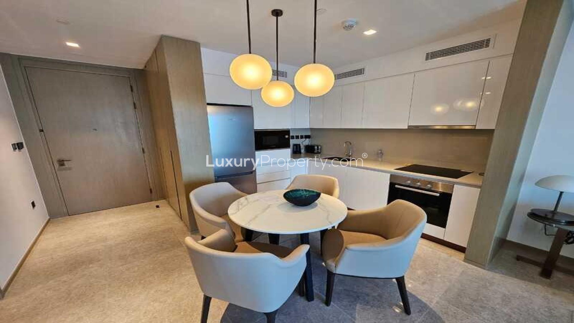 Furnished kitchen and dining area in 1-bedroom apartment, Address Harbour Point, Dubai Creek Harbour