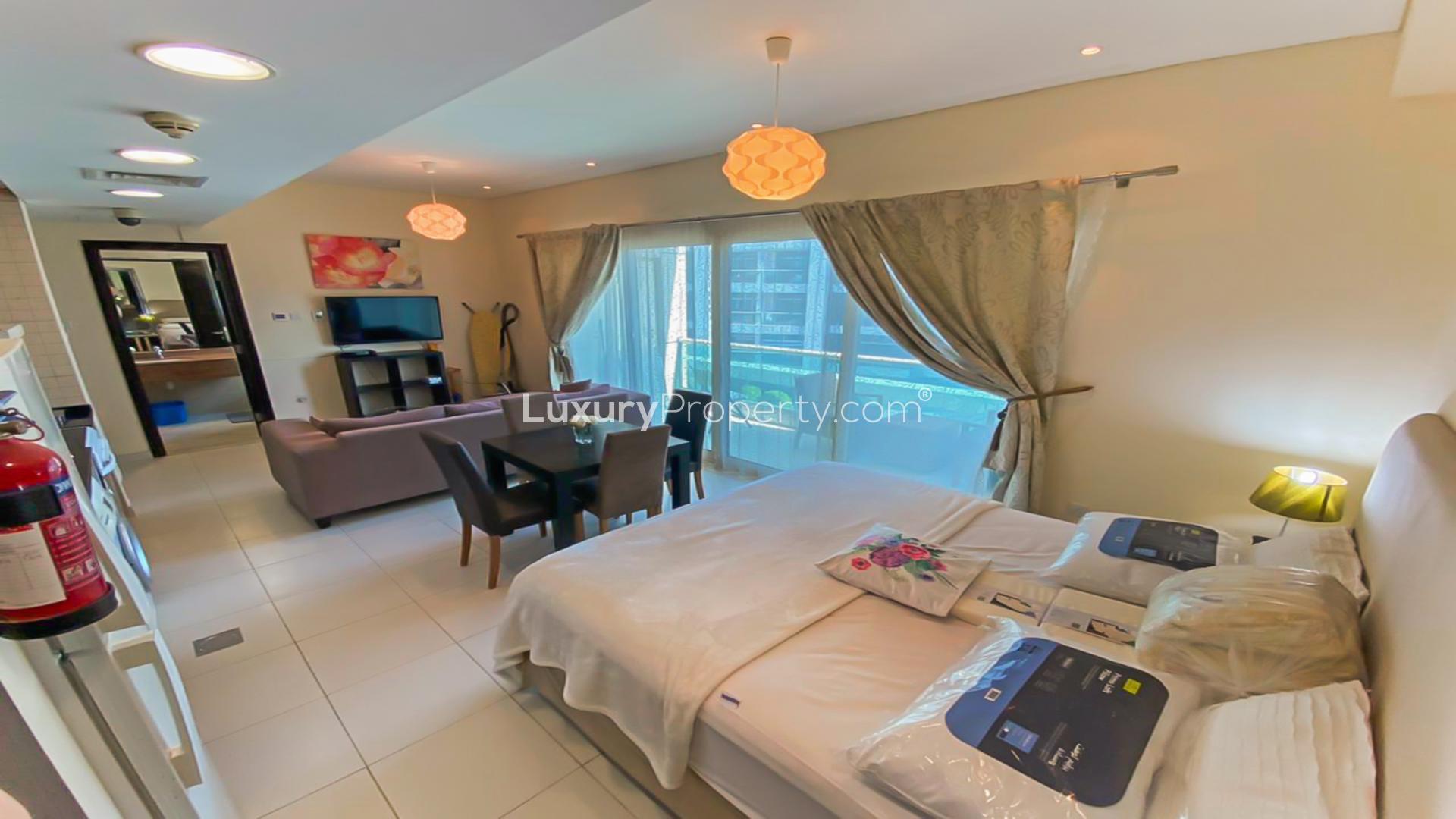 Modern open-plan living area in 1-bedroom apartment, Royal Oceanic, Dubai Marina